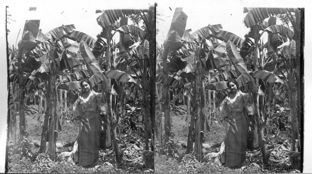 Tropical Beauties of Ermita - a Mestiza Maiden in a Banana Grove. Philippine Islands